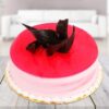 Berry-Infused Chocolate Cake with chocolate layers and fresh berry decorations.