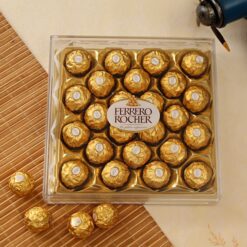 Ferrero Rocher Classic Pack with gold-wrapped hazelnut chocolates in an elegant gift box
