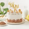 Mom’s Banoffee Delight Cake with creamy banana slices and toffee topping on a decorative plate