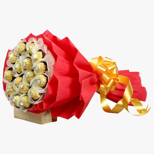 Elegant Ferrero Rocher chocolates beautifully arranged with fresh flowers in a gift bouquet.
