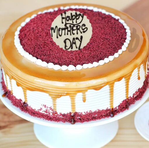 Velvet Red Café Delight – layered red velvet cake with smooth cream cheese frosting and vibrant red crumb decoration