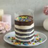 Chocolate Gemstone Pullup Cake with moist chocolate layers and edible chocolate gem decorations.