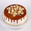 Caramel Cream Delight Cake with smooth caramel frosting and elegant floral decoration.