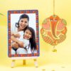 Colorful and vibrant Ganesha framed wall hanging with intricate design, perfect for spiritual home décor