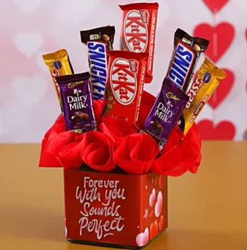 Delectable Chocolate Vase Gift – premium chocolates arranged elegantly in a decorative vase.