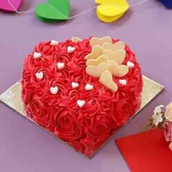 Luxe Heart Floral Cake—heart-shaped cake decorated with elegant edible flowers