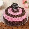 Elegant Women’s Day Cake decorated with floral buttercream roses and pastel colors.