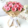 Blush Pink Gerbera Bouquet featuring soft pink gerbera daisies arranged elegantly.
