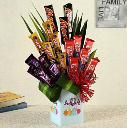 Birthday Chocolate Elegance Vase – premium chocolates artistically arranged in an elegant vase for birthday gifting.