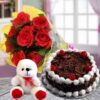 Surprise Party Treat Box with chocolates, floral cake, and fresh flowers.