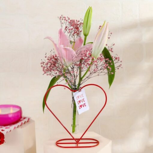 Delightful Heart Bloom Arrangement with lavender, pink, white, and peach roses in a woven basket
