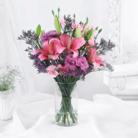 Lily Grace Flower Arrangement with elegant white lilies beautifully arranged for family gifting