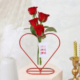 Love’s Radiant Heart Bouquet with lavender, pink, white, and peach roses arranged in a heart shape