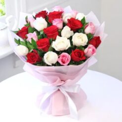 Lovable Rose Medley bouquet featuring assorted colorful roses.