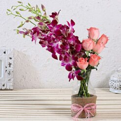 Colorful Garden Jar Bouquet – vibrant mixed flowers arranged in a decorative jar