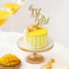 Mother’s Day mango cake topped with cream and fruit, named Mango Love Treat for Mom