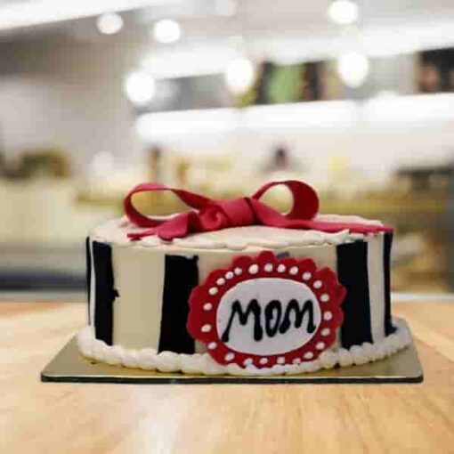 Royal Frost Delight designer cake with elegant frosting and luxury decoration for special occasions.