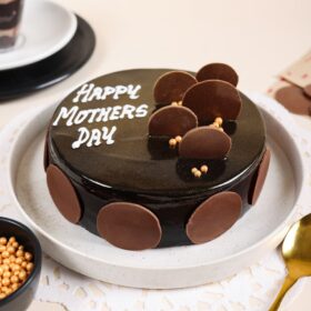 Truffle Elegance Celebration Cake – elegant chocolate truffle cake with smooth ganache and decorative accents