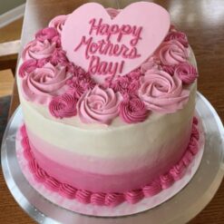Mom’s Elegant Floral Cake – pastel buttercream cake adorned with intricate floral designs for Mother’s Day