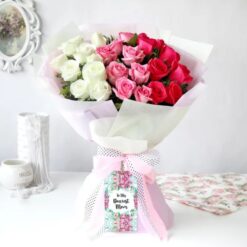 Elegant Ombre Rose Symphony bouquet showcasing a gradient of soft-colored roses arranged beautifully