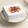 Mom’s Square Celebration Cake – elegant square-shaped cake with delicate decorations and smooth frosting.