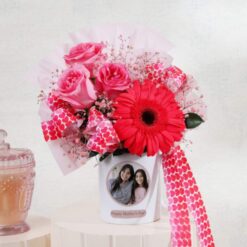 Custom floral bouquet arranged as a personalized tribute for Mom with mixed flowers and greenery