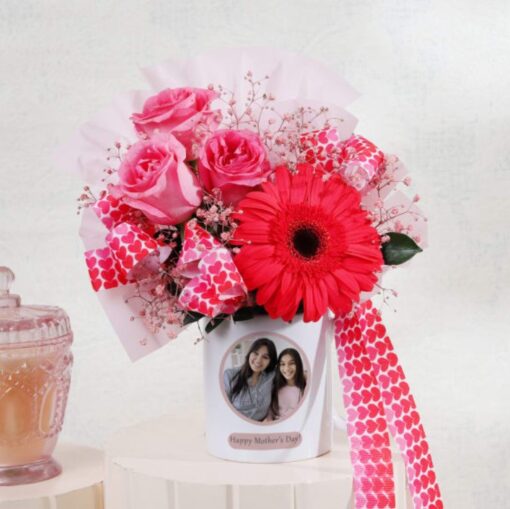 Custom floral bouquet arranged as a personalized tribute for Mom with mixed flowers and greenery