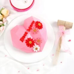 Heartfelt Mother’s Day Pinata cake shaped like a heart with a surprise inside