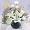Opulent White Lily Roses bouquet featuring white lilies and elegant white roses arranged beautifully