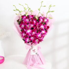 Elegant orchid bouquet with white and purple orchids arranged beautifully for Mom.