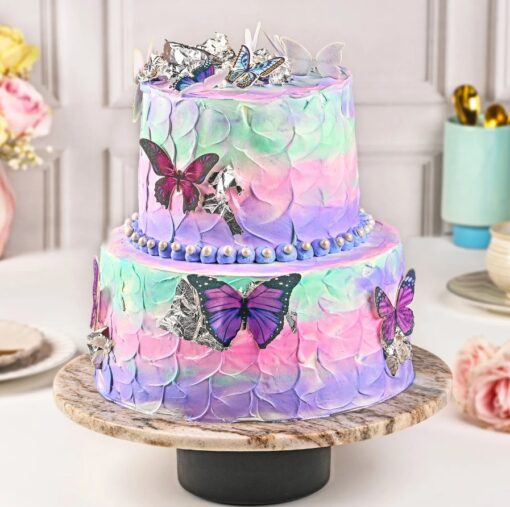 Moist chocolate cake with rich ganache and delicate edible pearl decorations