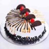 Oreo pineapple cake with creamy layers, pineapple chunks, and Oreo biscuit topping.