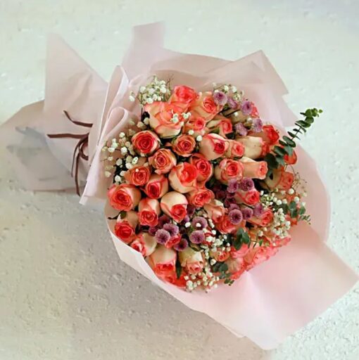 Blushing Pink Daisy Bouquet – soft pink daisies arranged in an elegant bouquet