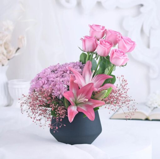 Blush Pink Elegance Bouquet featuring soft pink roses and complementary blooms arranged beautifully