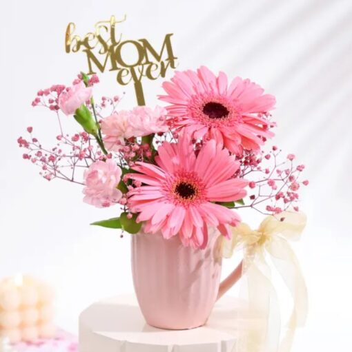 Delicate Pink Petal Tribute bouquet with soft pink flowers arranged elegantly