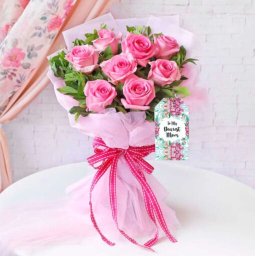 Elegant Pink Rose Tribute featuring a bouquet of soft pink roses arranged elegantly for gifting mom