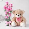 Pink Roses Teddy Gift set with fresh pink roses and a soft teddy bear, ideal for romantic and family gifting occasions.