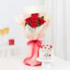 Love’s Radiant Bloom Cake featuring a vibrant flower bouquet alongside a beautifully decorated cake