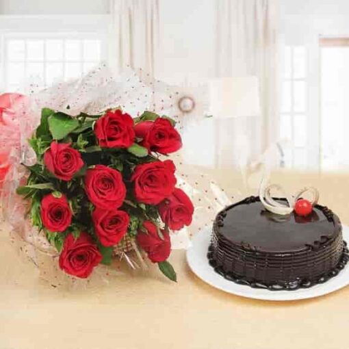 Roses & Rich Chocolate Celebration featuring a bouquet of fresh roses and a decadent chocolate cake.