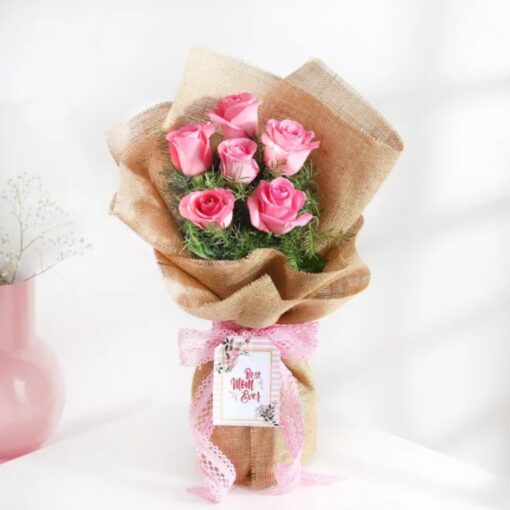 Elegant Rose Garden Bouquet featuring roses, gerberas, dianthus, and eucalyptus arranged beautifully