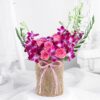 Rose Orchid Elegance Ensemble featuring vibrant roses and delicate orchids arranged in a luxurious bouquet