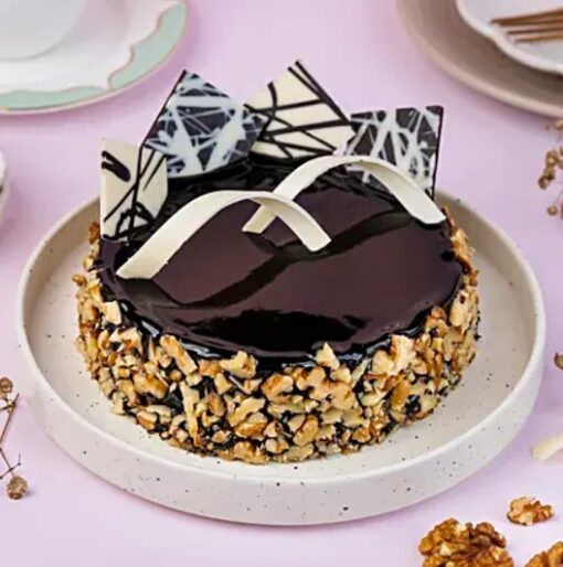 Walnut Chocolate Truffle Delight – chocolate cake with truffle filling and walnut toppings.