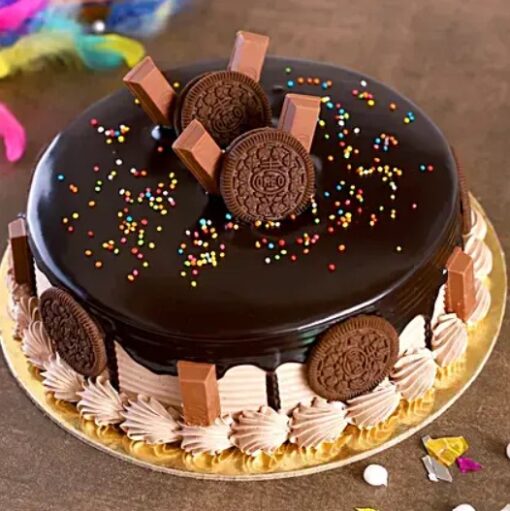 Oreo Chocolate Delight Cake – chocolate cake with creamy Oreo layers and Oreo cookie crumbs topping.