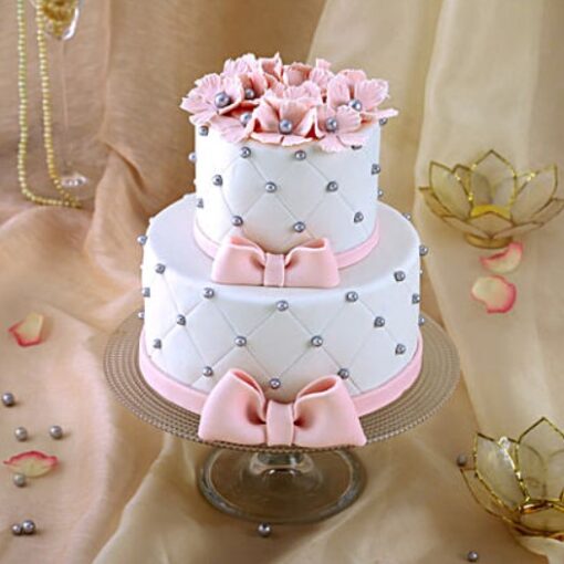 Dual Tier Artistic Cake – two-tier cake with intricate artistic decoration