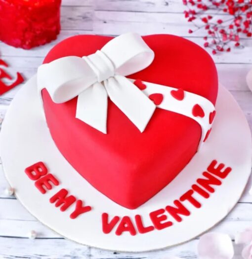 Heartfelt Valentine Cake – red velvet heart-shaped cake with creamy frosting and romantic decorations