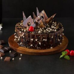 Marble Truffle Crunch Cake – swirled marble cake with chocolate truffle filling and crunchy chocolate toppings