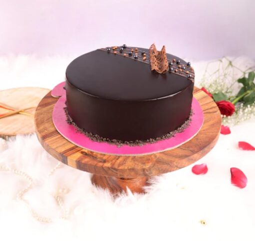 Chocolate Ganache Drip Cake – cake with smooth glossy chocolate ganache drips.