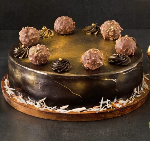Ferrero Rocher Delight Cake – chocolate hazelnut cake decorated with Ferrero Rocher chocolates and Nutella frosting
