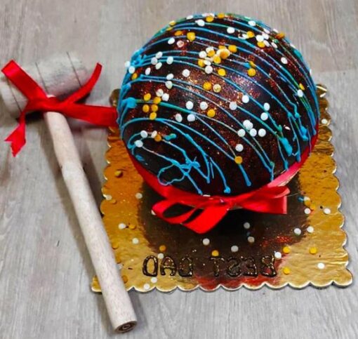 Chocolate Fiesta Pinata Cake – chocolate cake filled with candy and chocolate buttercream frosting.
