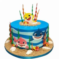 Baby Shark Celebration Cake – colorful cake featuring Baby Shark theme for children’s birthday.